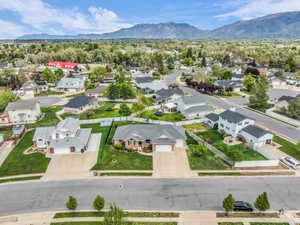Aerial view of residential area with a mountain backdrop