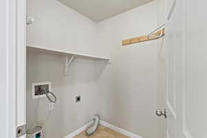 Laundry area with washer hookup and hookup for an electric dryer