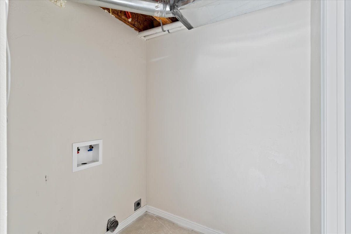 2nd Laundry room featuring washer hookup and electric dryer hookup