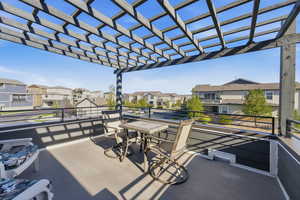 View of patio / terrace with a residential view and a pergola