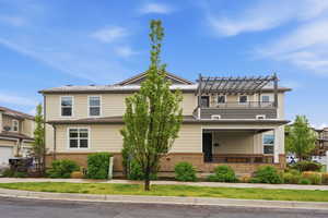 View of front of house featuring brick siding