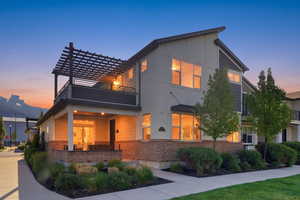 View of front of property featuring brick siding