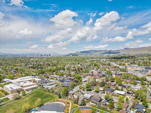 Aerial view of residential area with a mountain backdrop