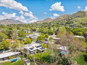 Aerial view of residential area with a mountainous background