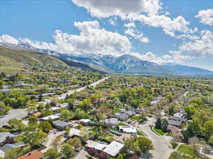 Aerial perspective of suburban area featuring a mountain backdrop