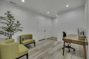Office area featuring recessed lighting and light wood-type flooring