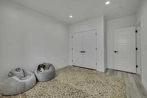 Misc room featuring recessed lighting and light wood-style flooring