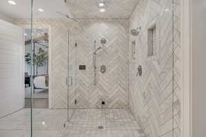 Full bathroom featuring a stall shower