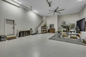 Garage featuring a ceiling fan