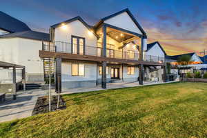 Rear view of house with a patio and french doors