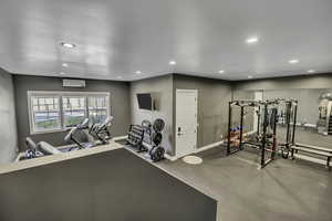 Workout room with recessed lighting