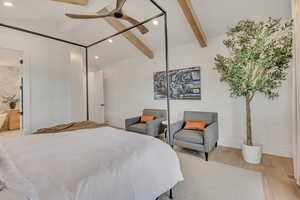 Bedroom with recessed lighting, light wood-style flooring, lofted ceiling with beams, and a ceiling fan