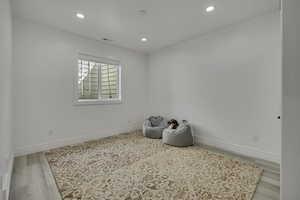 Unfurnished room featuring recessed lighting and light wood-style flooring