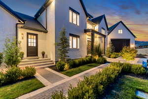 View of front of house with brick siding