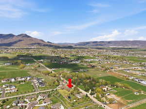 Aerial perspective of suburban area with mountains