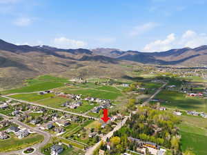 Aerial view of residential area featuring mountains