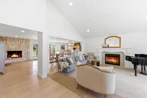 Living room with fireplace (capped, not connected), shown with virtual fire for illustration