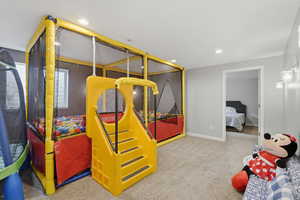 Rec room featuring light carpet and recessed lighting