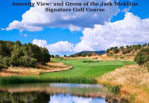 View of home's community with a water and mountain view and golf course view