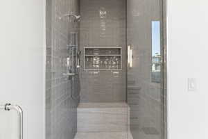 Full bath featuring a stall shower