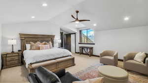 Bedroom with light colored carpet, recessed lighting, lofted ceiling, and a ceiling fan