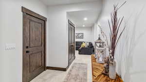 Foyer featuring recessed lighting and light wood-type flooring