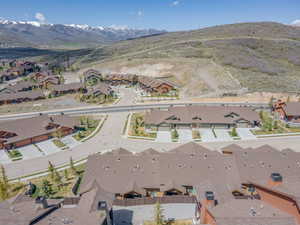Aerial view of residential area with a mountain backdrop