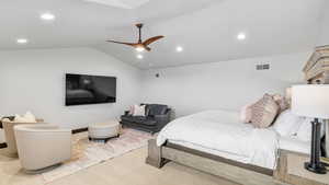Carpeted bedroom with ceiling fan, recessed lighting, and vaulted ceiling
