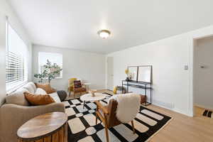 Front living room with light wood LVP floors.