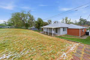 Back of property featuring a patio area