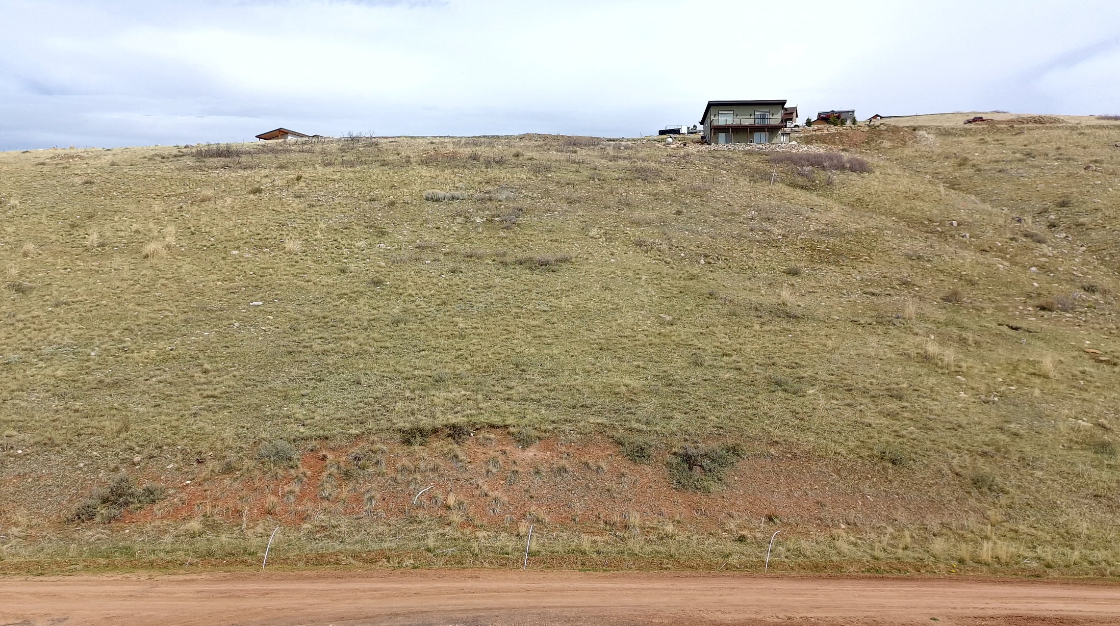 View of yard with a rural view