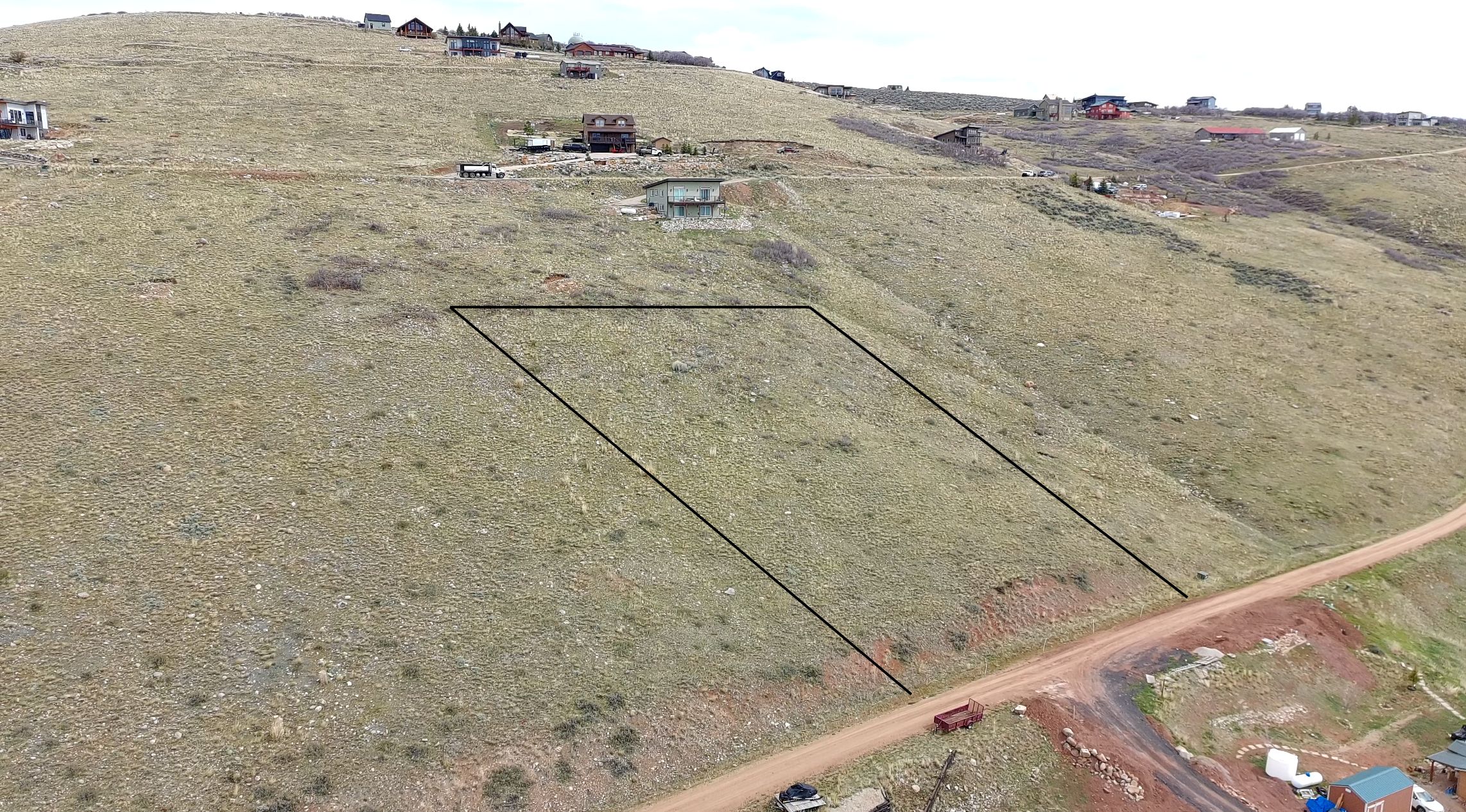 Aerial view of property's location with property parcel outlined