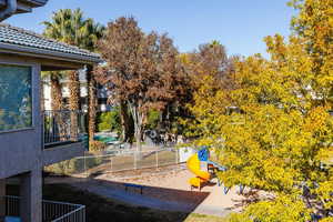 View from Balcony, Playground and 1of3 HOA pools