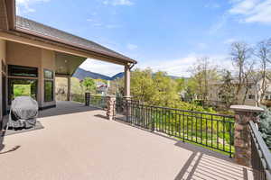View of patio / terrace with a mountain view and grilling area