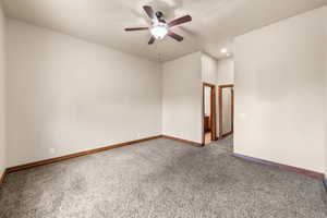 Unfurnished room featuring carpet floors, a ceiling fan, and recessed lighting