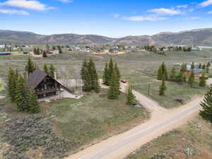View of mountain background featuring rural landscape