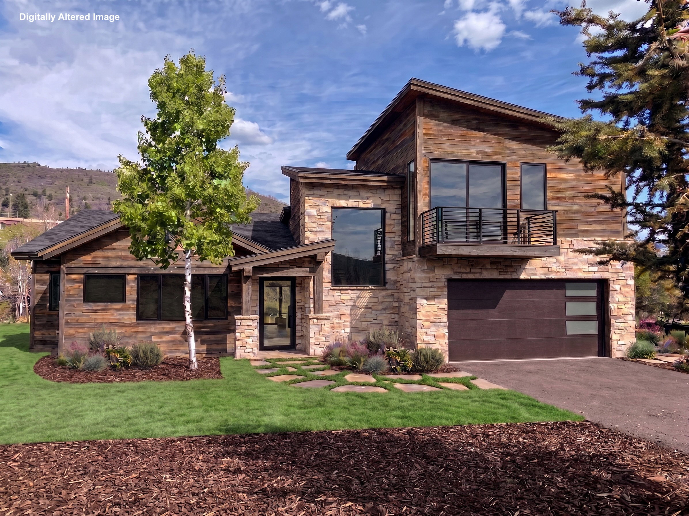 Modern home featuring stone siding, an attached garage, a balcony, driveway, and a front yard