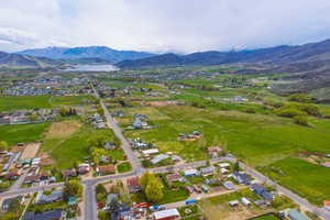 Aerial view of residential area featuring mountains