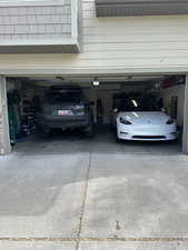 Garage with driveway  Garage door opener and room for Two cars