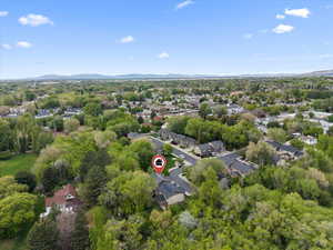 Aerial view of residential area featuring mountains  Shows your home on red circle
