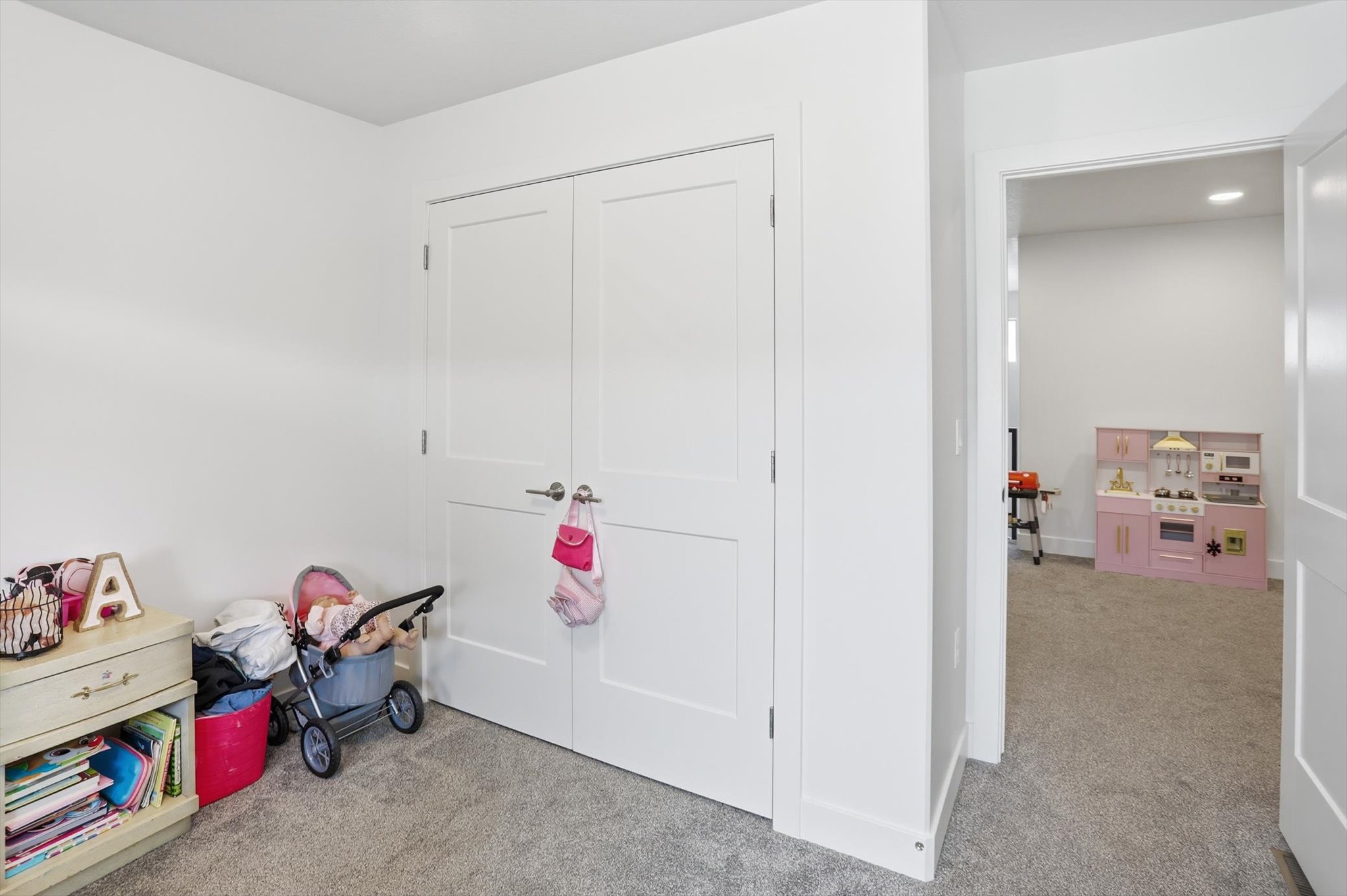 Rec room featuring light colored carpet