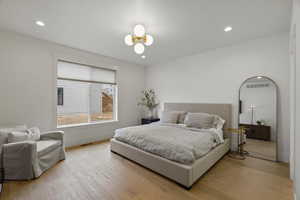 Bedroom featuring light wood finished floors and recessed lighting