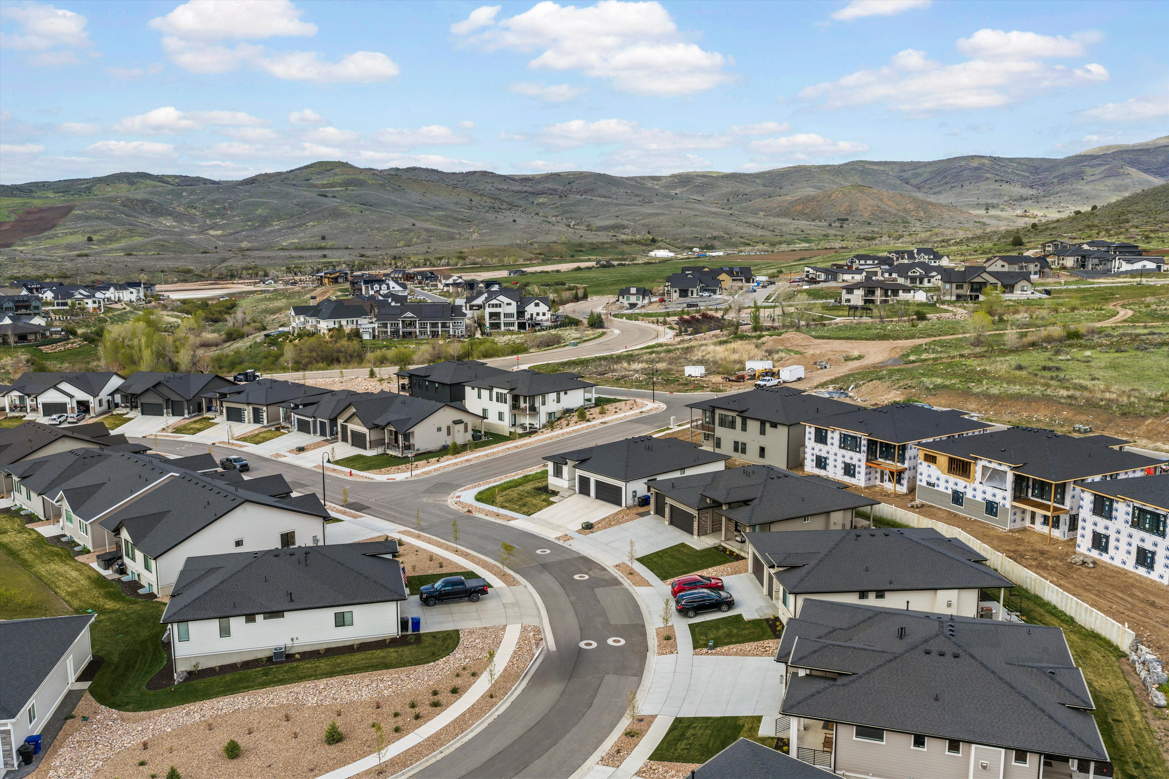 Aerial view of residential area with a mountain backdrop