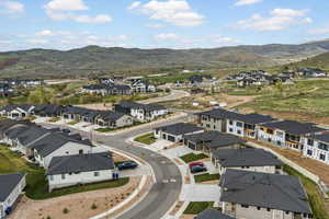 Aerial view of residential area with a mountain backdrop