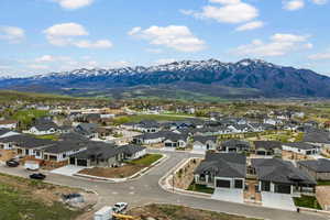 Aerial view of residential area with a mountainous background