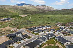 Aerial view of residential area featuring mountains