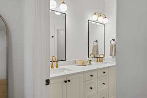 Full bathroom with double vanity