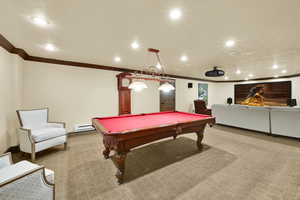 Rec room featuring carpet floors, recessed lighting, ornamental molding, billiards, and a baseboard radiator