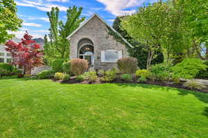 View of front of house featuring brick siding
