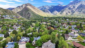 Aerial view of residential area with mountains